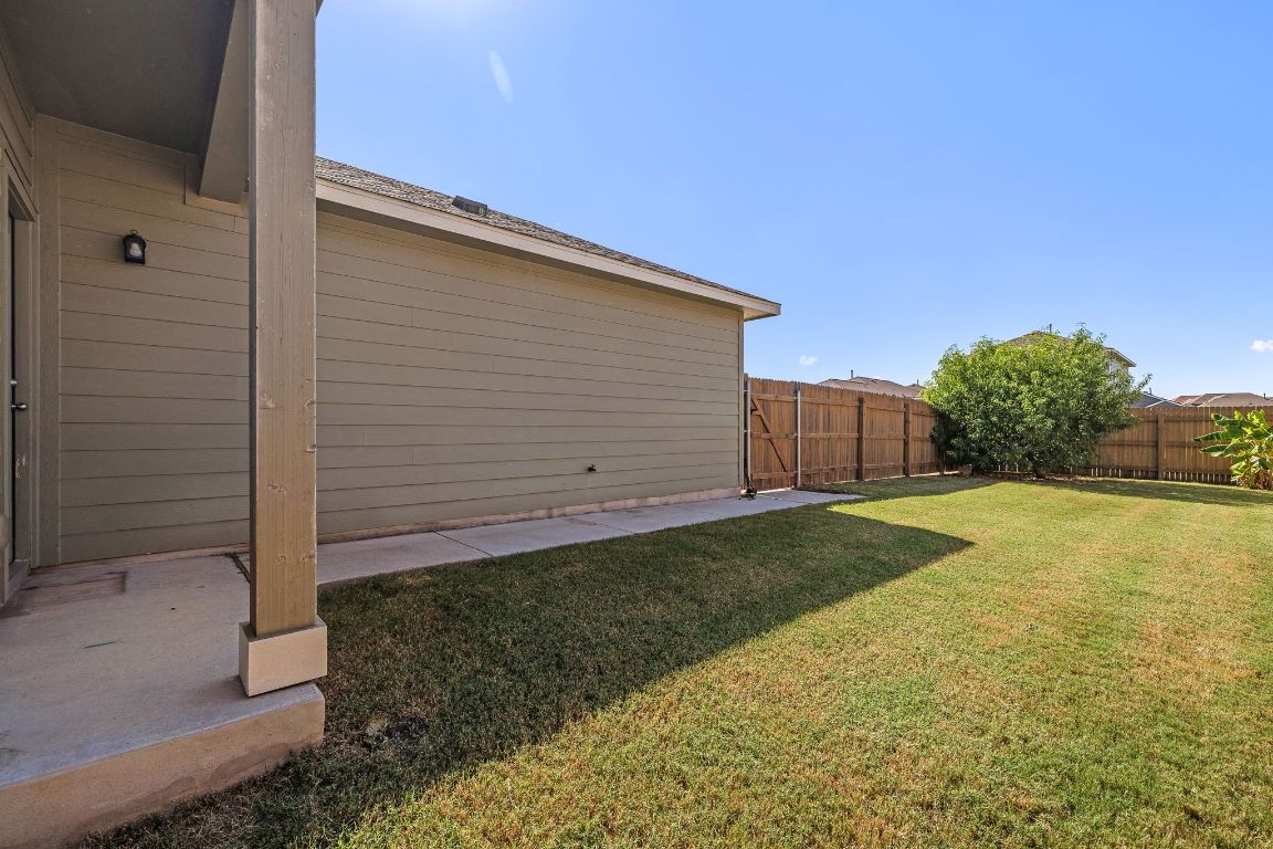 321 Arabian Colt Drive Georgetown, TX 78626 - Photo 20 of 24 a view of a backyard