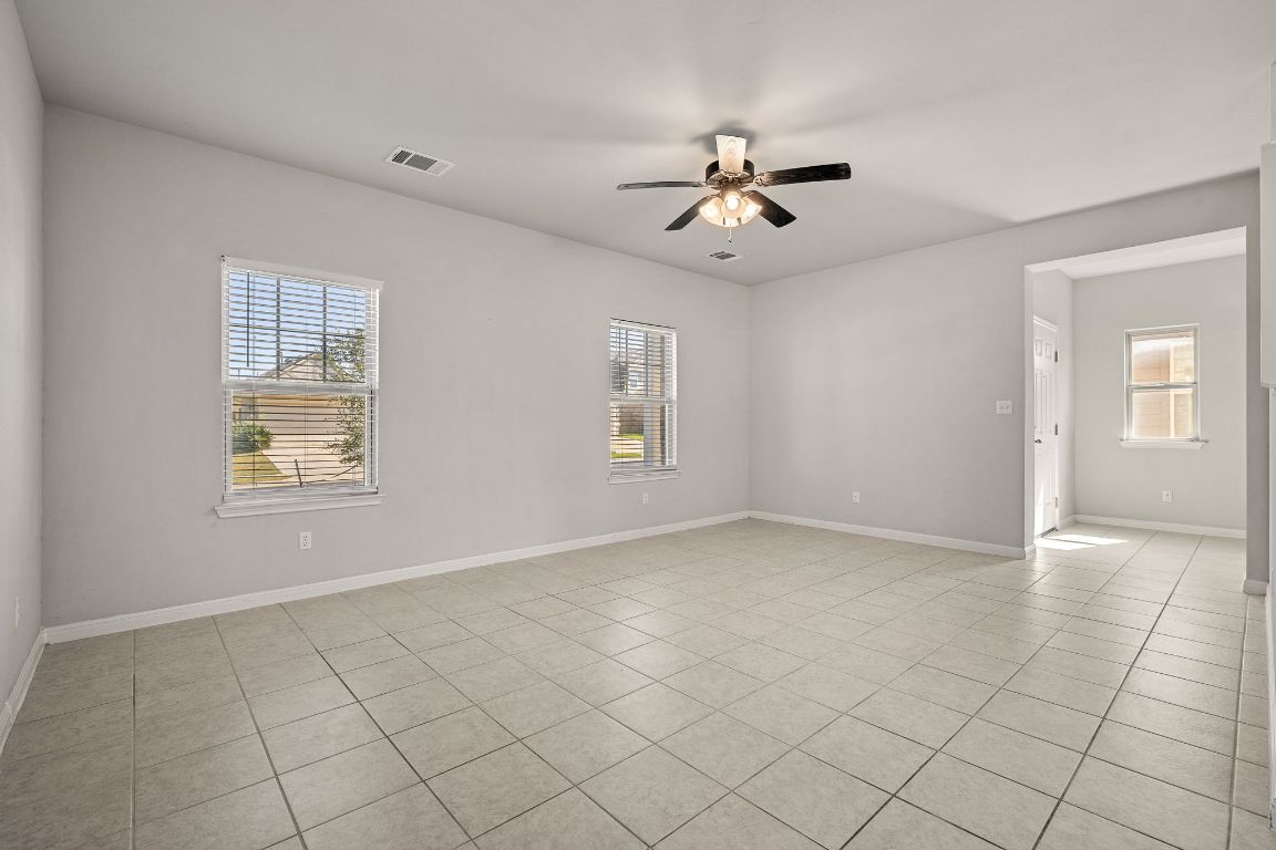 321 Arabian Colt Drive Georgetown, TX 78626 - Photo 7 of 24 a view of an empty room with a window