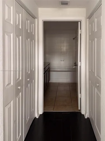 a view of entryway with a door