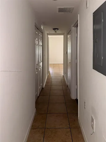 a hallway with closet