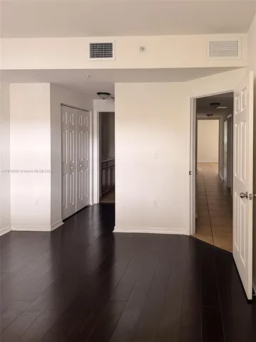 a view of a livingroom with wooden floor