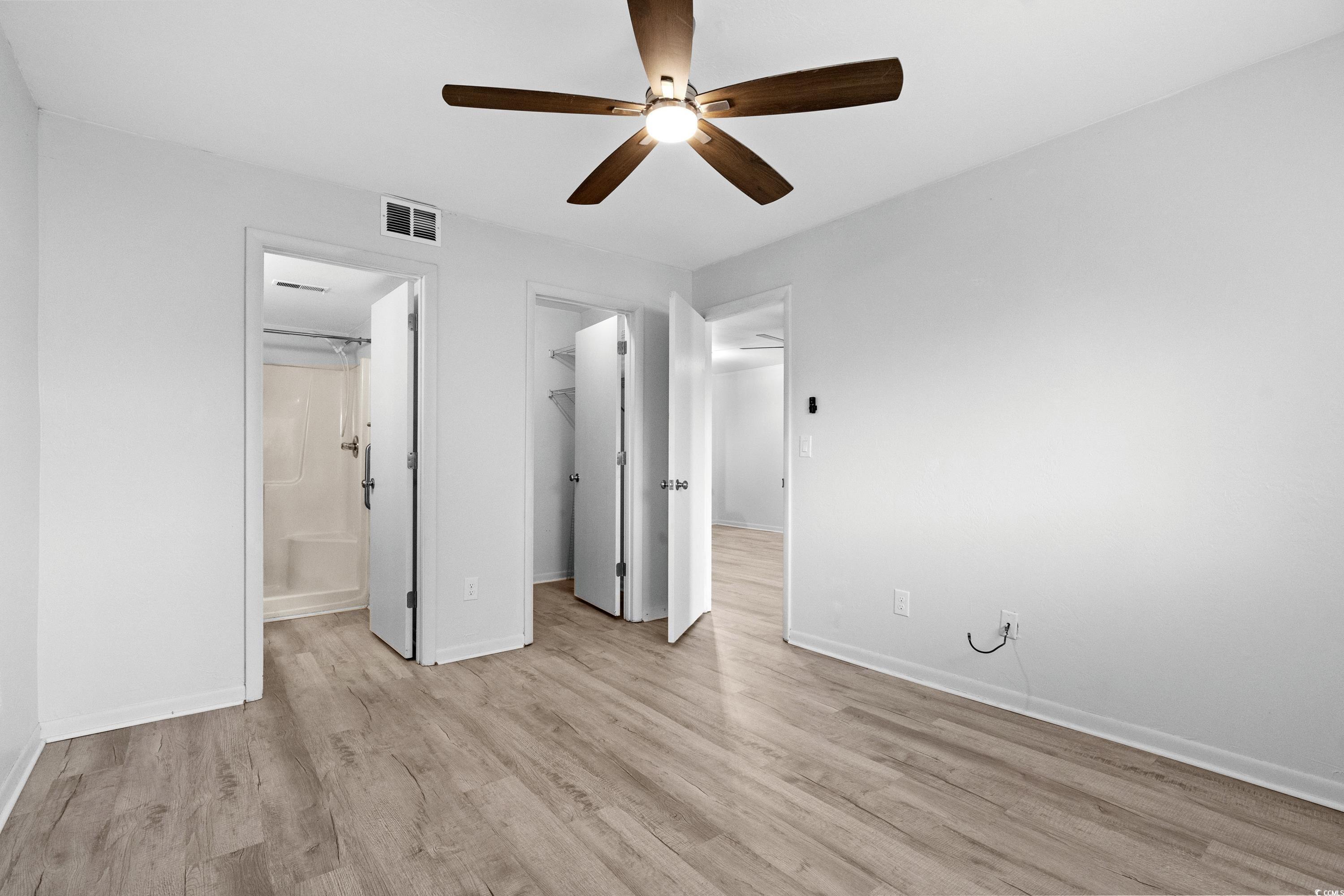 1301 Pridgen Road, Unit 1008 Myrtle Beach, SC 29577 - Photo 13 of 23 Unfurnished bedroom featuring connected bathroom,