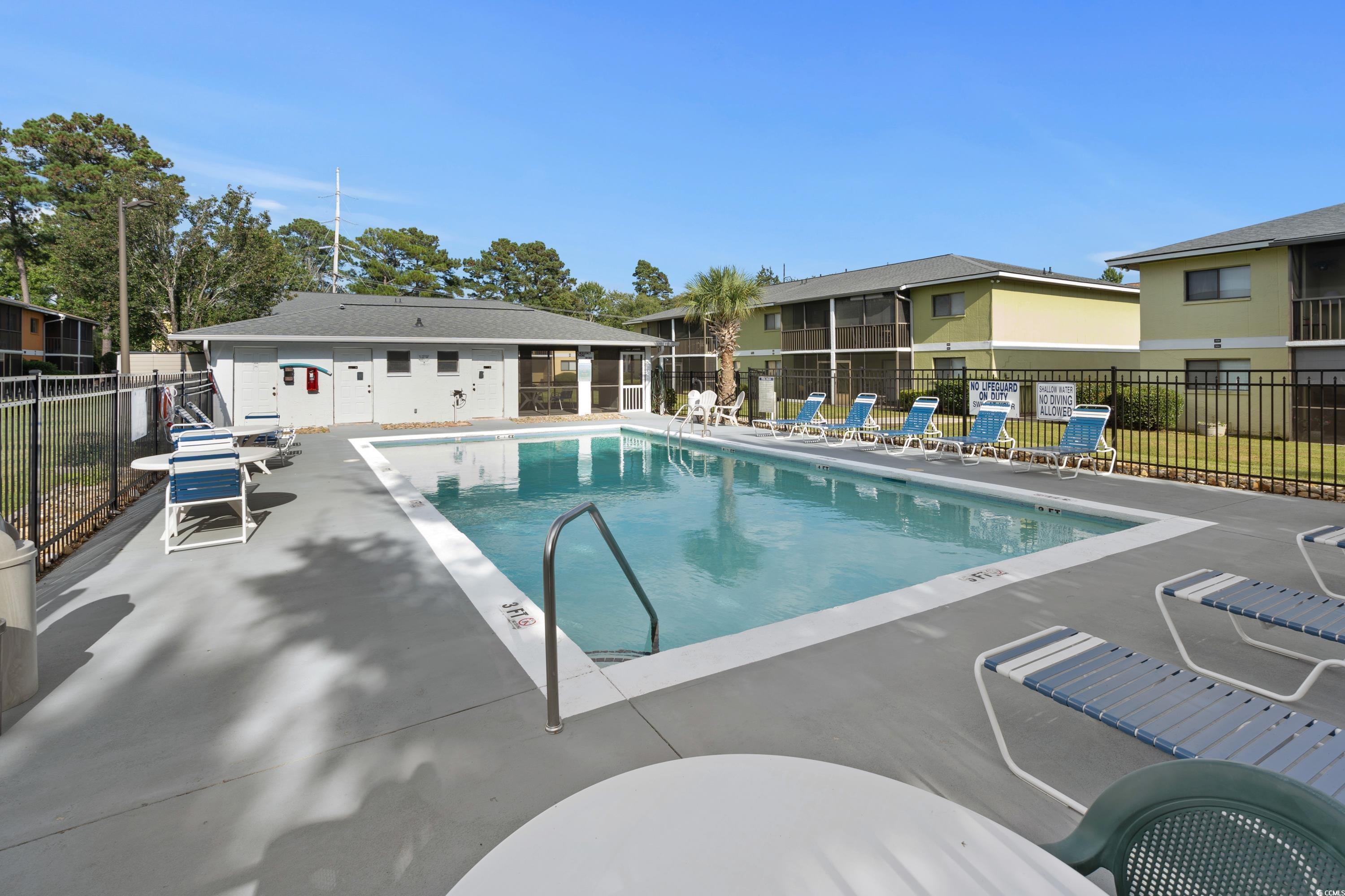 1301 Pridgen Road, Unit 1008 Myrtle Beach, SC 29577 - Photo 17 of 23 View of swimming pool with a patio