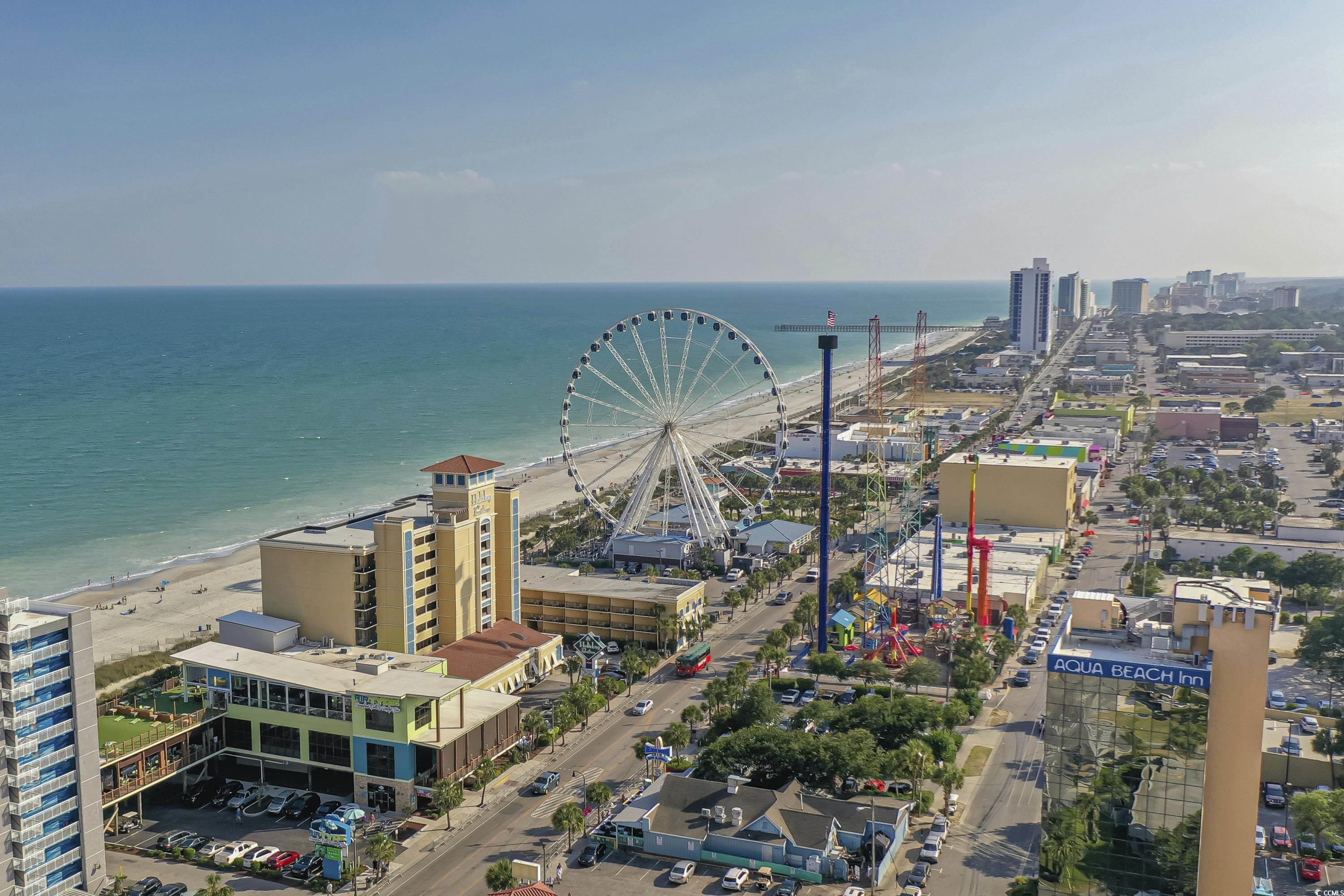 1301 Pridgen Road, Unit 1008 Myrtle Beach, SC 29577 - Photo 21 of 23 Drone / aerial view with a view of the beach and a