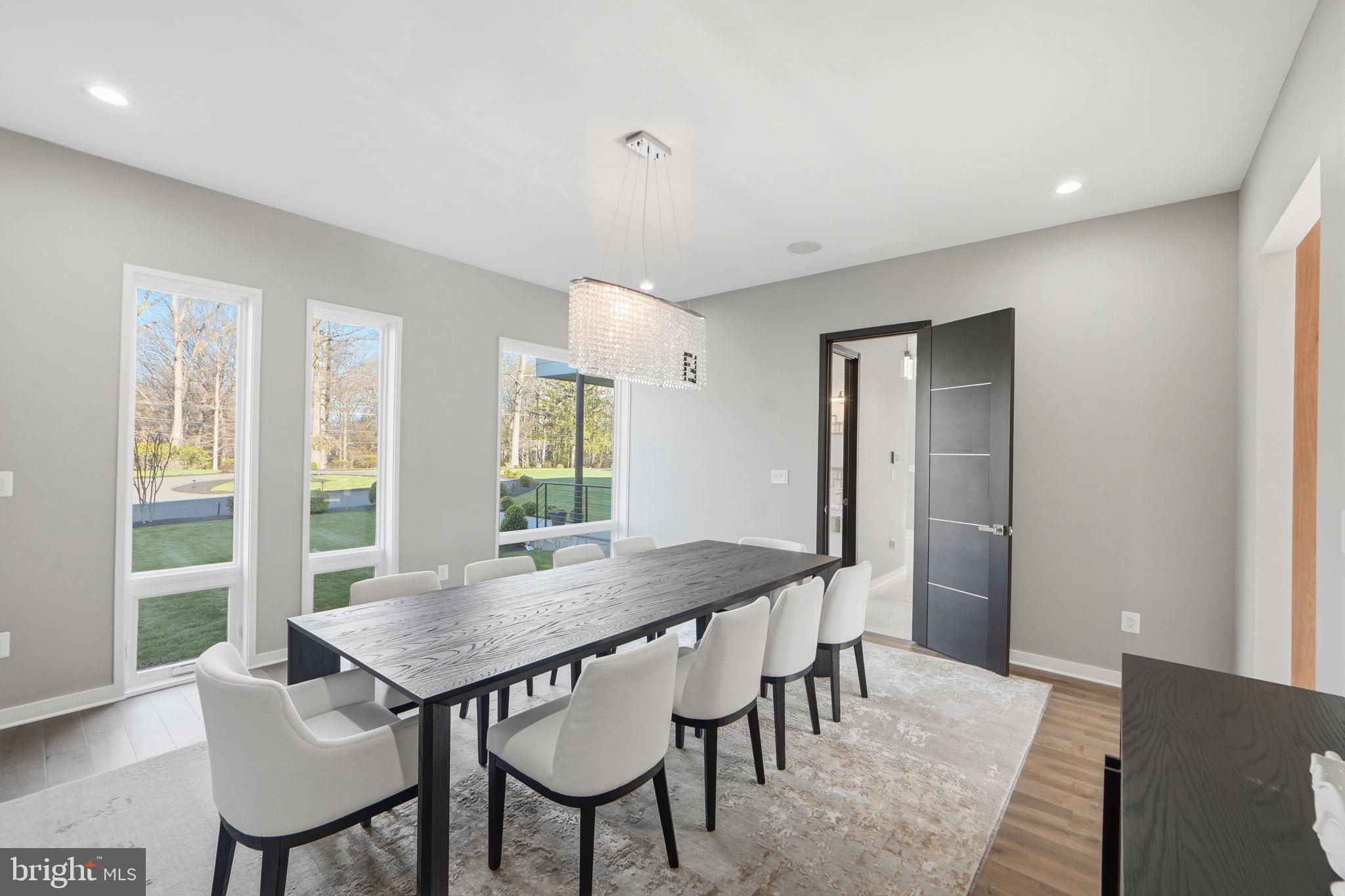 2368 Hunter Mill Road Vienna, VA 22181 - Photo 18 of 74 a view of a dining room with furniture and wooden floor