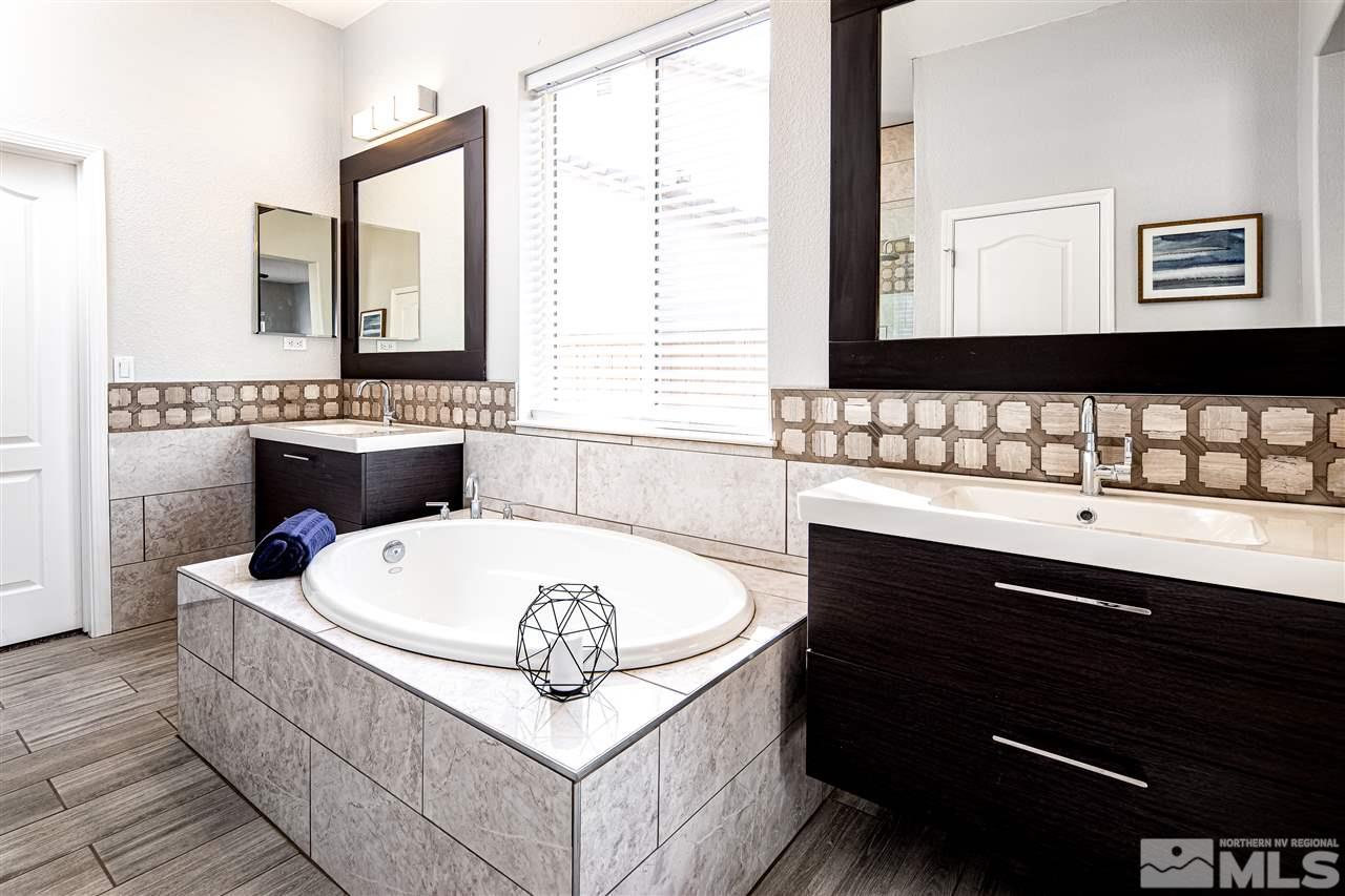 10535 Autumn Walk Court Reno, NV 89521 - Photo 13 of 25 a bathroom with a sink and a bathtub