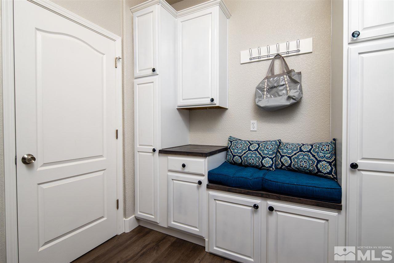 10535 Autumn Walk Court Reno, NV 89521 - Photo 19 of 25 a kitchen with a refrigerator and cabinets