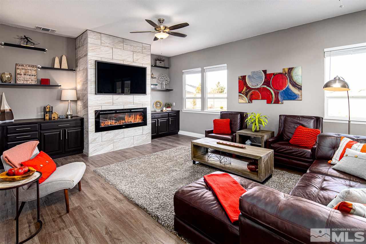 10535 Autumn Walk Court Reno, NV 89521 - Photo 6 of 25 a living room with furniture and a flat screen tv