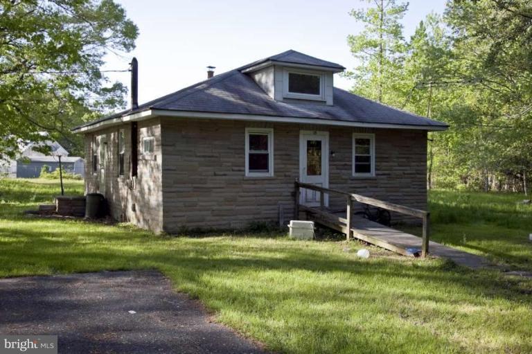 115 Bengies Road Middle River, MD 21220 - Photo 1 of 2 a front view of a house with a yard