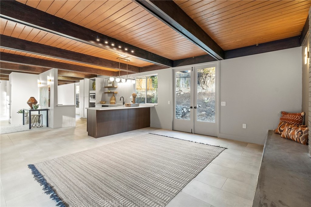 4084 Miramonte Place Riverside, CA 92501 - Photo 24 of 60 a large room with wooden cabinets