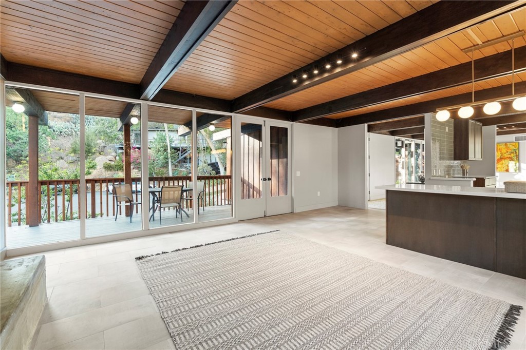 4084 Miramonte Place Riverside, CA 92501 - Photo 25 of 60 a view of a porch with wooden floor and seating space