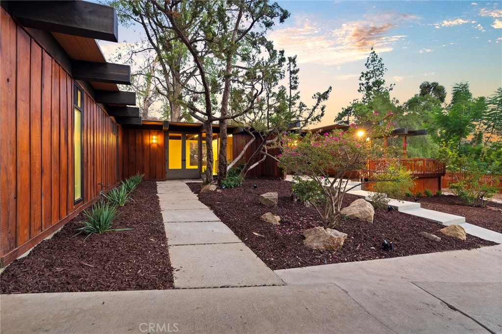4084 Miramonte Place Riverside, CA 92501 - Photo 3 of 60 a view of a pathway with a yard