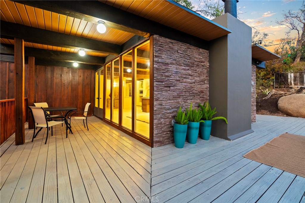 4084 Miramonte Place Riverside, CA 92501 - Photo 6 of 60 a view of a house with barbeque and wooden floor