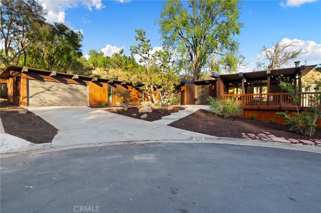 4084 Miramonte Place Riverside, CA 92501 - Photo 9 of 60 a view of a house with a street
