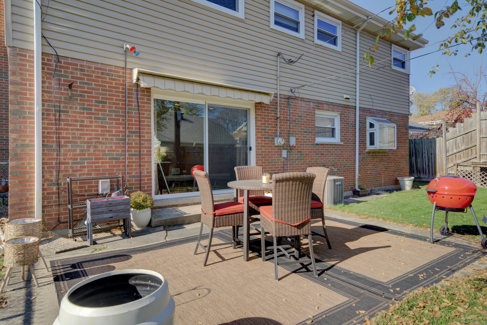 9211 Washington Road Morton Grove, IL 60053 - Photo 24 of 29 a view of a patio with table and chairs and potted plants
