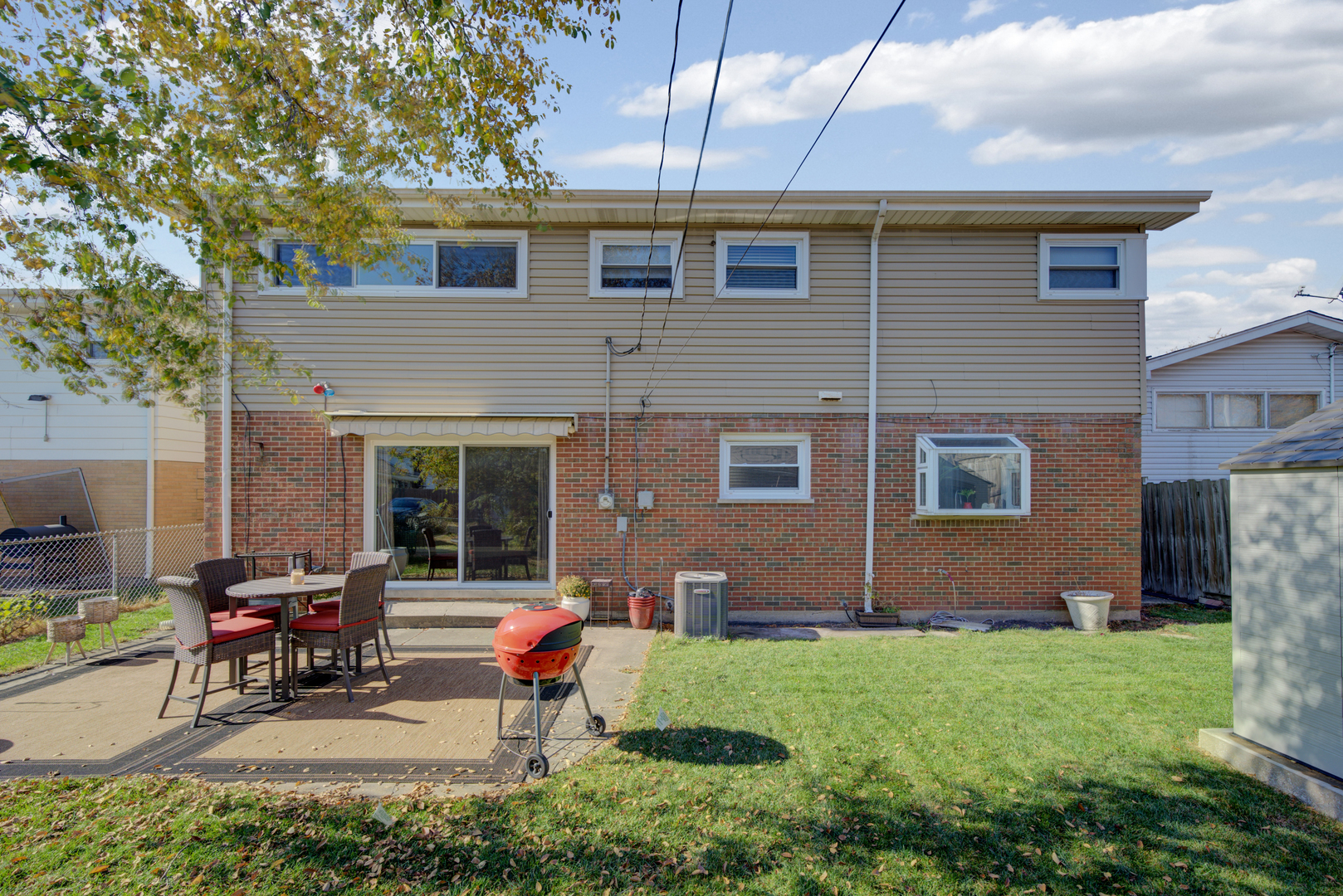 9211 Washington Road Morton Grove, IL 60053 - Photo 25 of 29 a backyard of a house with seating space