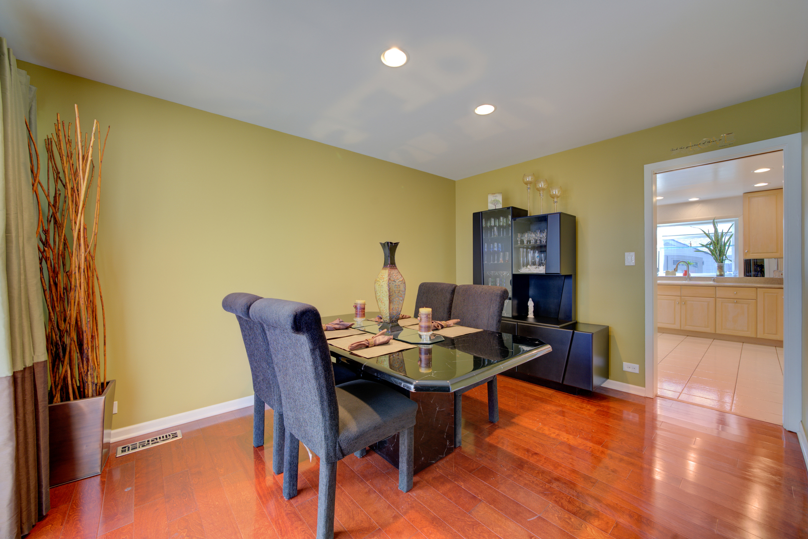 9211 Washington Road Morton Grove, IL 60053 - Photo 5 of 29 a dining room with furniture and wooden floor
