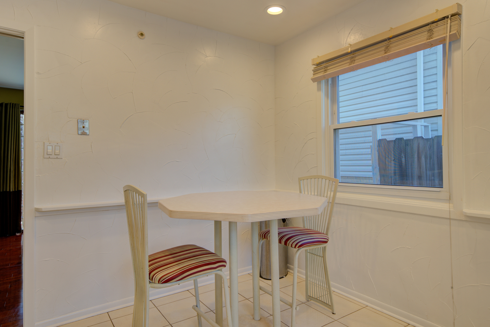 9211 Washington Road Morton Grove, IL 60053 - Photo 8 of 29 a view of storage and utility room with racks on the wall