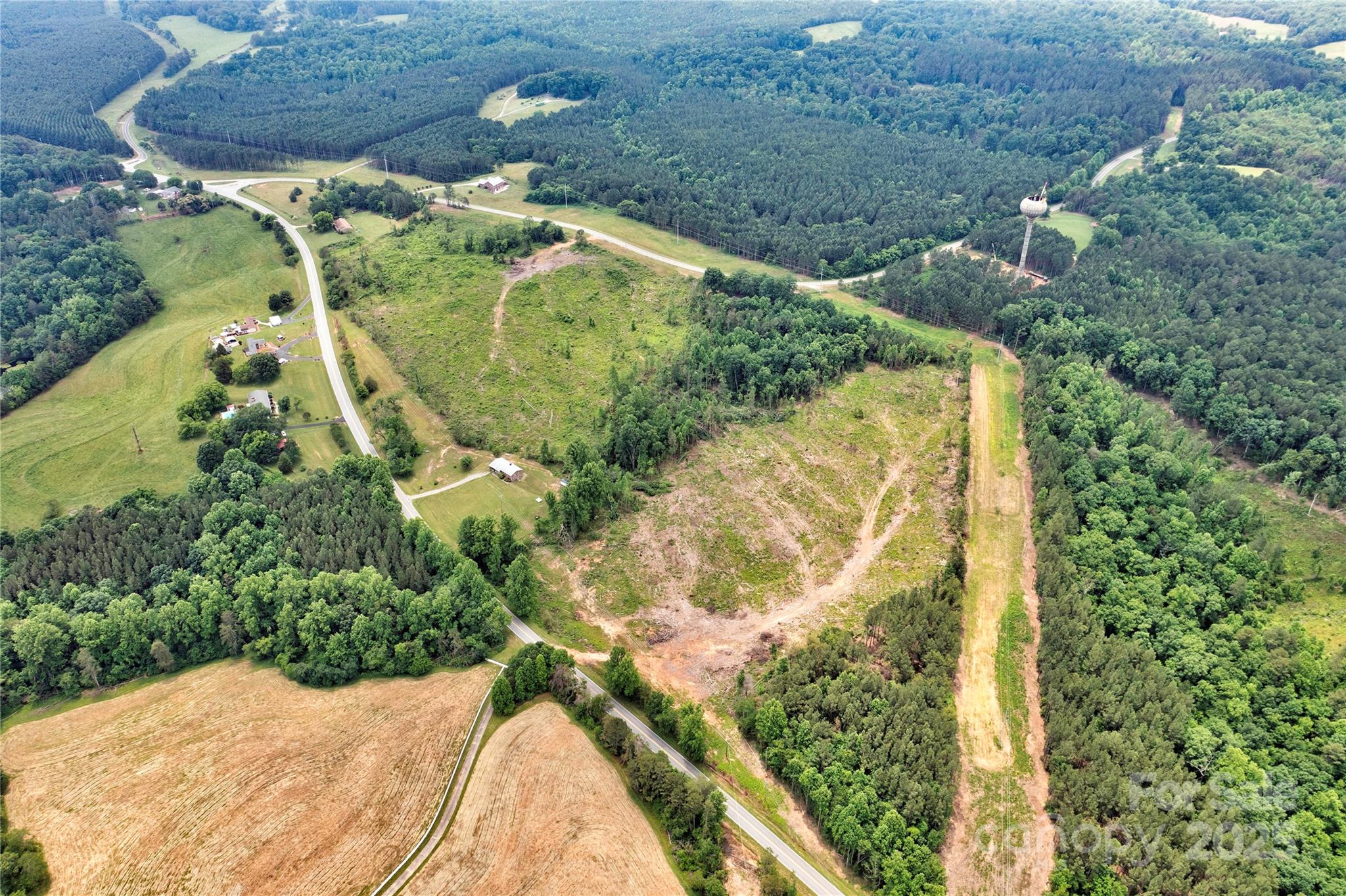 0 Polkville Road Lawndale, NC 28090 - Photo 2 of 9 a view of a garden with a pathway