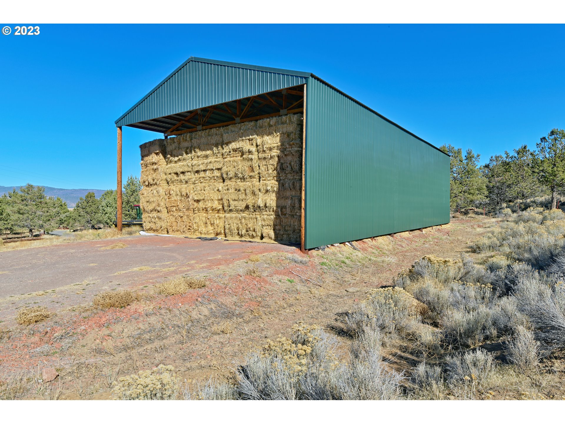 Mitchell Road Dairy, OR 97625 - Photo 16 of 18 a front view of a house with a yard