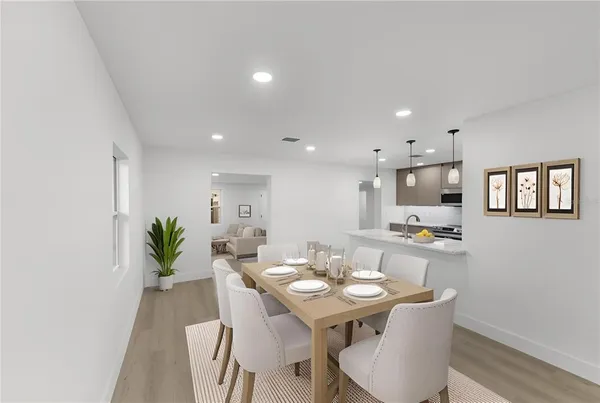 a view of a dining room with furniture