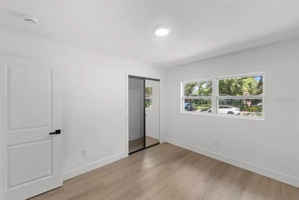 an empty room with windows