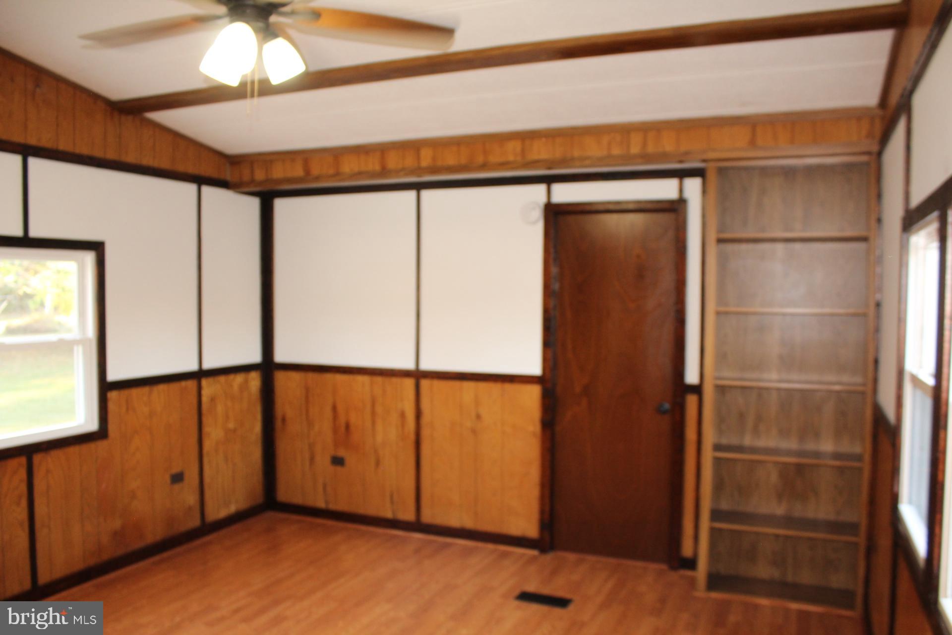 5274 Burr Hill Road Rhoadesville, VA 22542 - Photo 11 of 66 a view of an empty room with a window