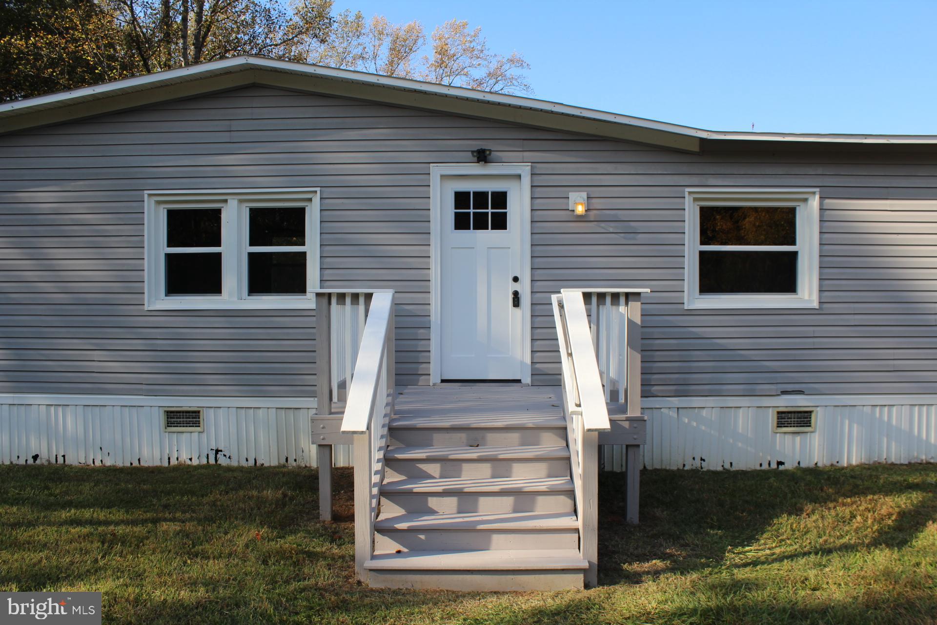 5274 Burr Hill Road Rhoadesville, VA 22542 - Photo 2 of 66 a front view of house with stairs