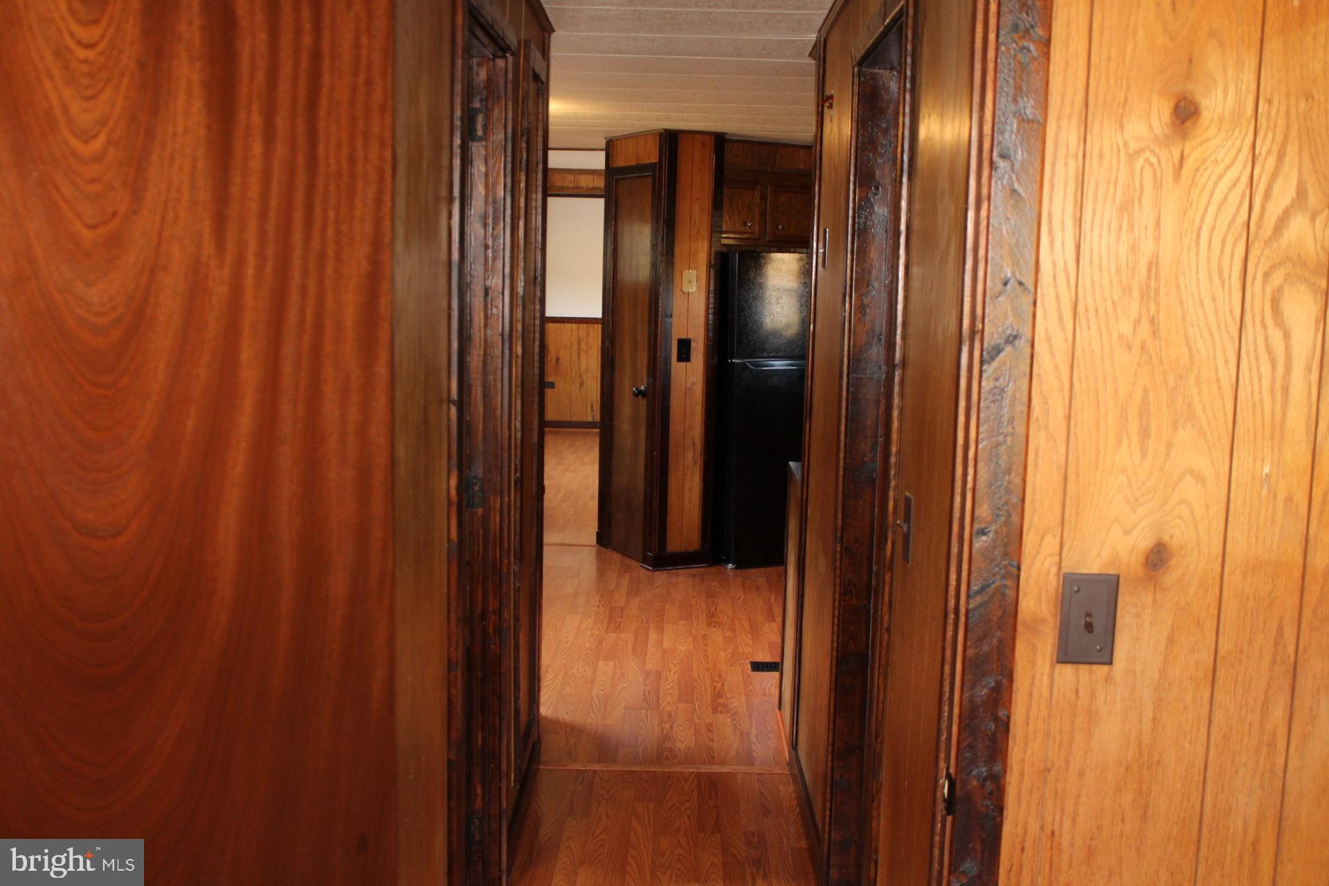 5274 Burr Hill Road Rhoadesville, VA 22542 - Photo 35 of 66 Bedroom two. View down hallway.