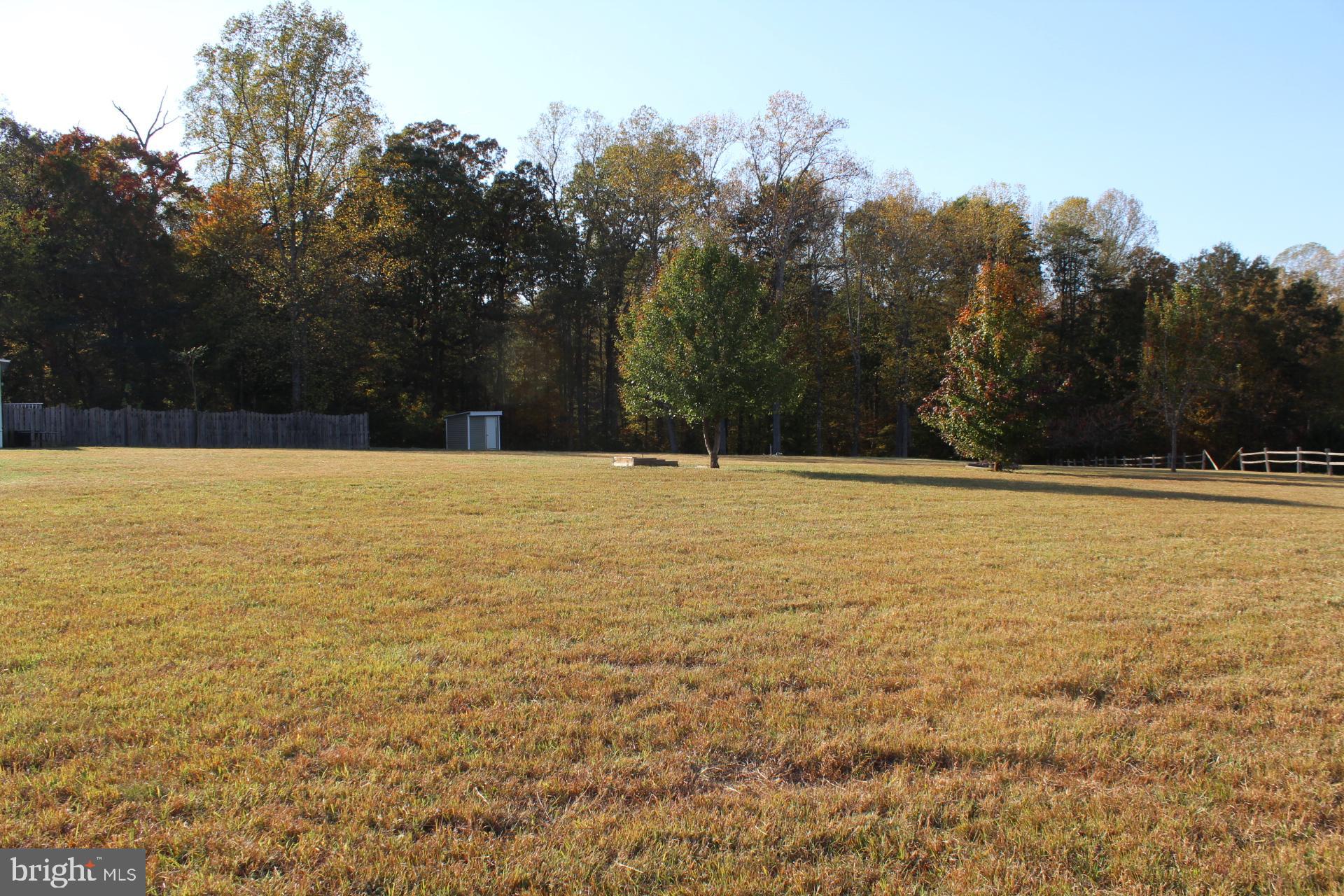 5274 Burr Hill Road Rhoadesville, VA 22542 - Photo 51 of 66 a view of an ocean with trees