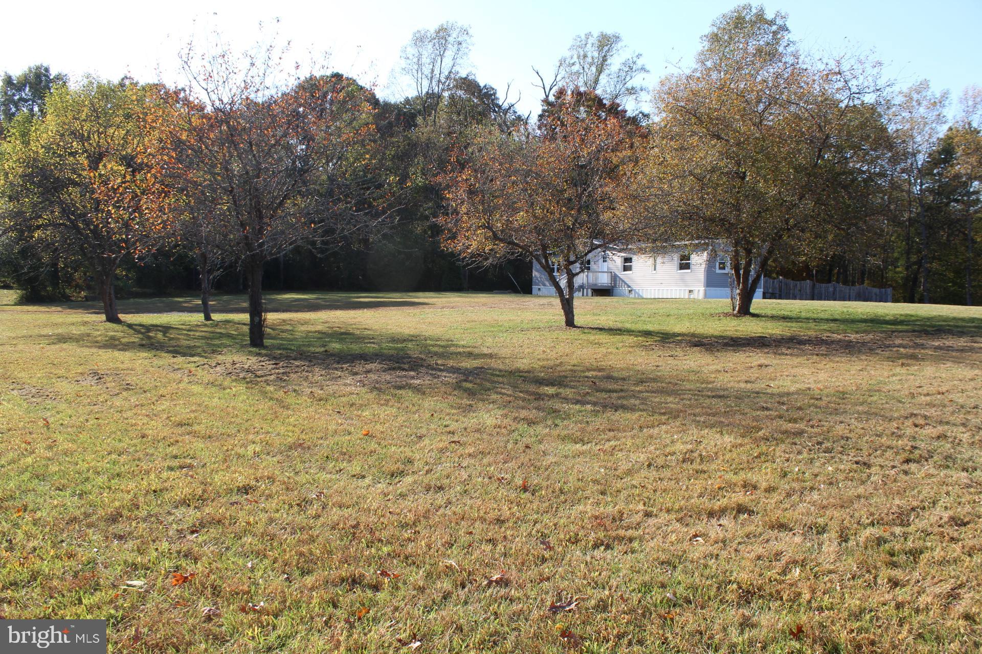 5274 Burr Hill Road Rhoadesville, VA 22542 - Photo 61 of 66 a house with lots of trees