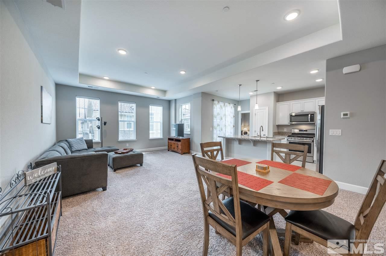 1852 Sea Horse Road, Unit A Reno, NV 89521 - Photo 3 of 21 a view of a dining room with furniture