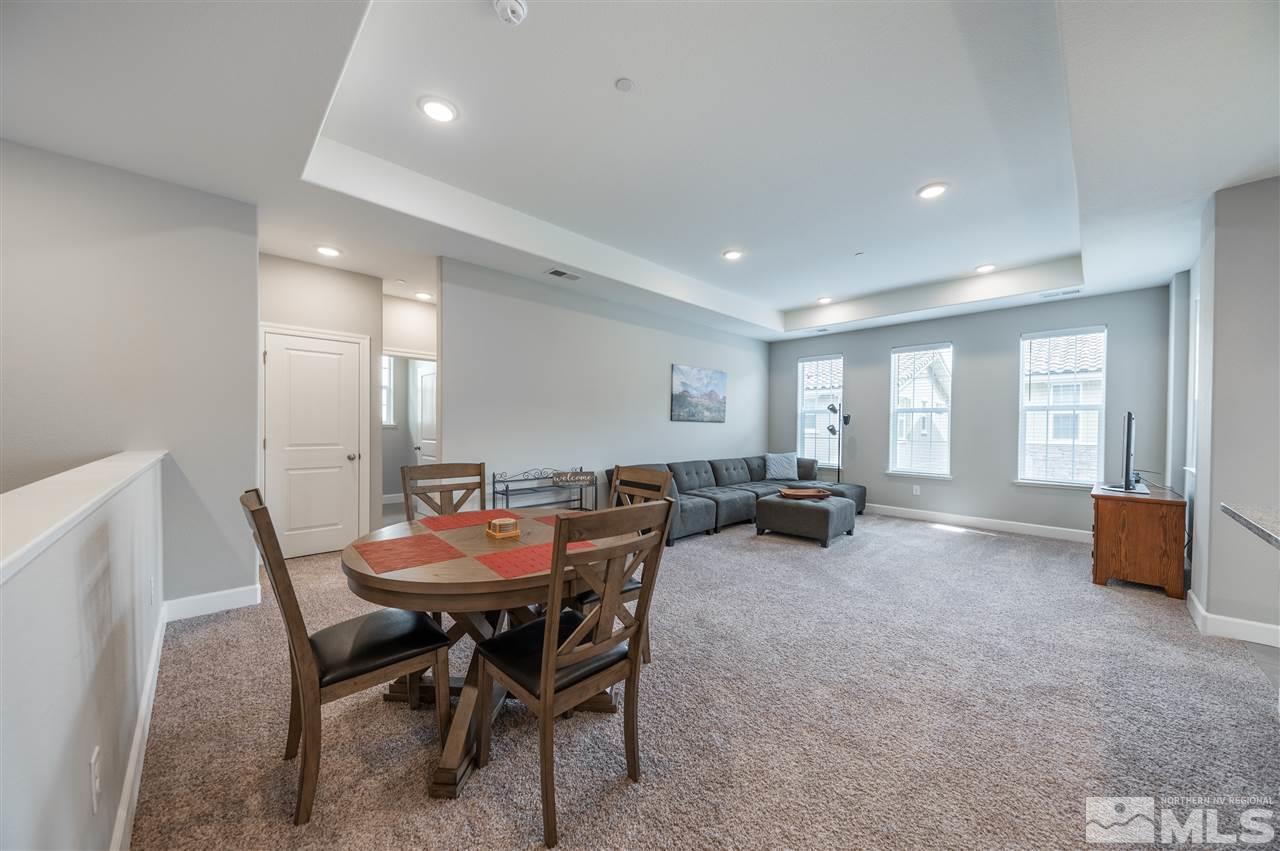 1852 Sea Horse Road, Unit A Reno, NV 89521 - Photo 6 of 21 a view of a dining room with furniture and window