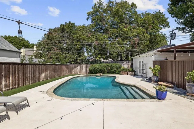 a view of a house with a swimming pool