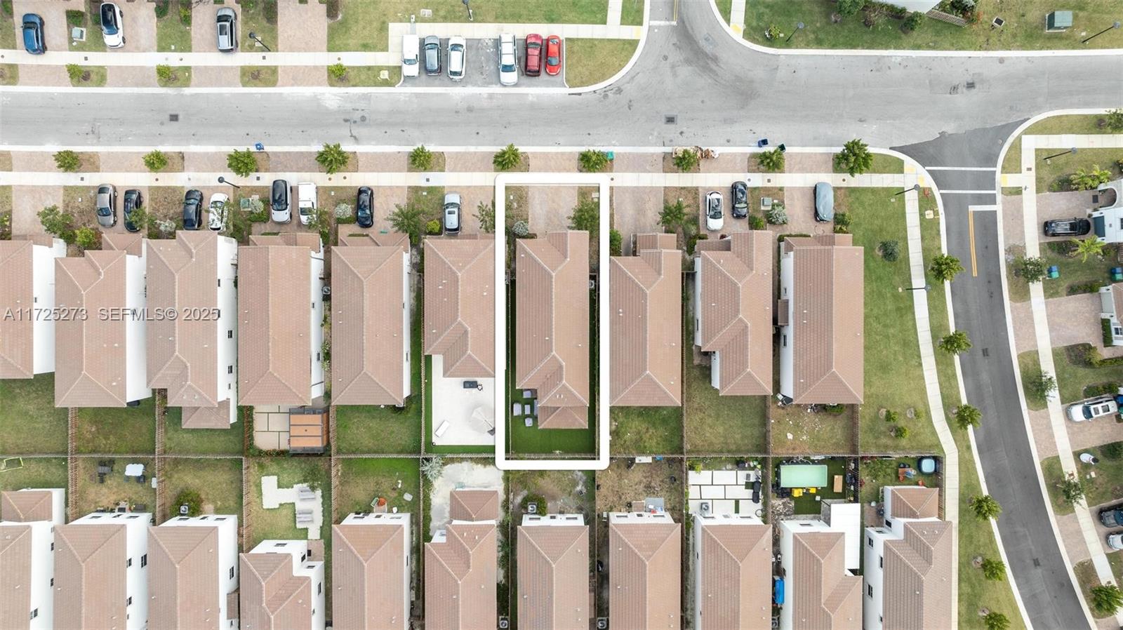 2357 Northwest 130th Street Miami, FL 33167 - Photo 10 of 48 a front view of a building with glass windows and plants