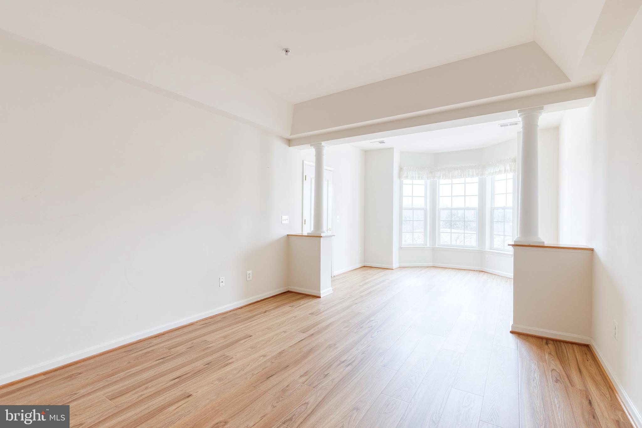 7305 Brookview Road, Unit 308 Elkridge, MD 21075 - Photo 13 of 25 Neutral paint and large open living space