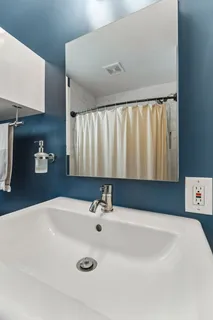 a bathroom with a sink and a tub