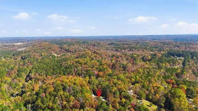 a picture of a bathroom with a shower