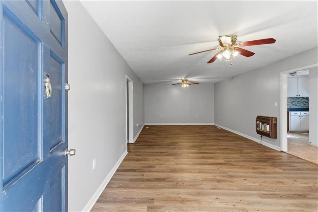 1500 Moores Ferry Road Southwest Plainville, GA 30733 - Photo 4 of 31 a view of empty room with wooden floor