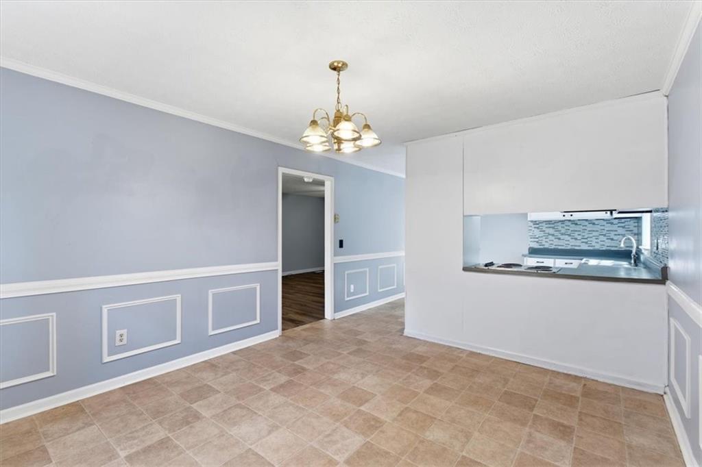 1500 Moores Ferry Road Southwest Plainville, GA 30733 - Photo 10 of 31 a view of a kitchen with microwave and refrigerator