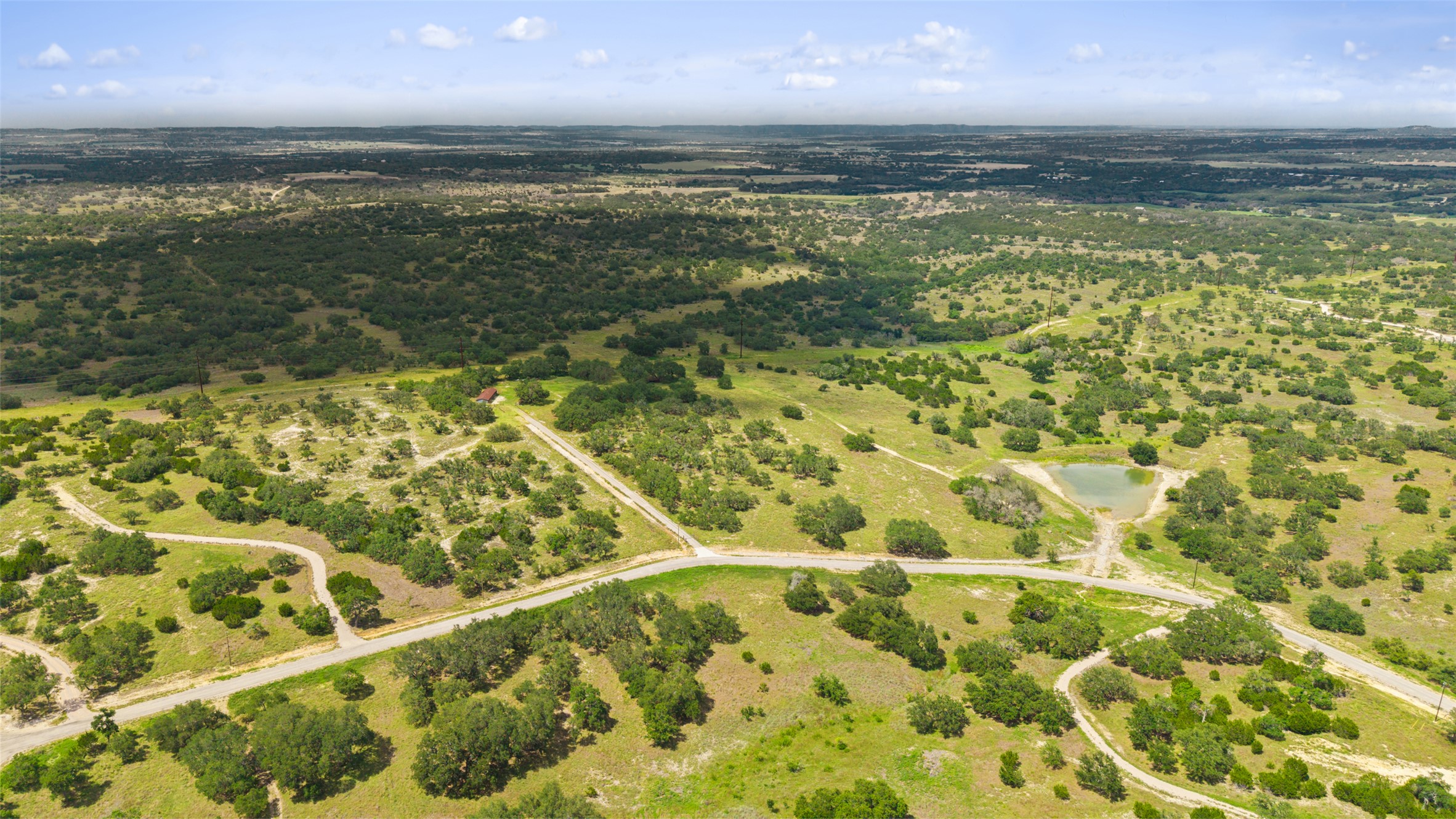 4112 Schumann Road Stonewall, TX 78671 - Photo 4 of 10 Vast natural landscape provides serene country living and ample space for privacy.
