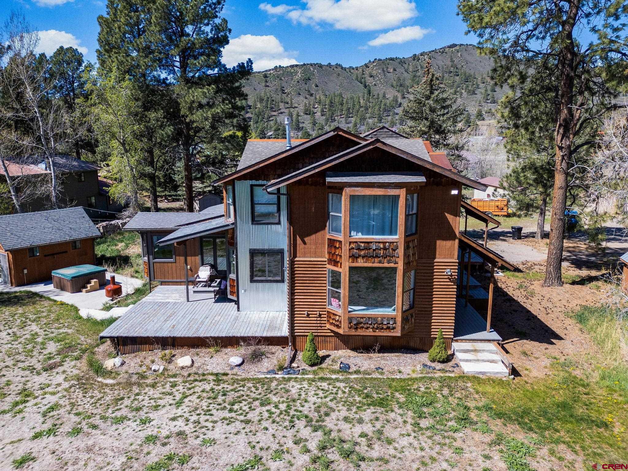 522 Pine River Ranch Circle Bayfield, CO 81122 - Photo 29 of 36 a front view of a house with a yard