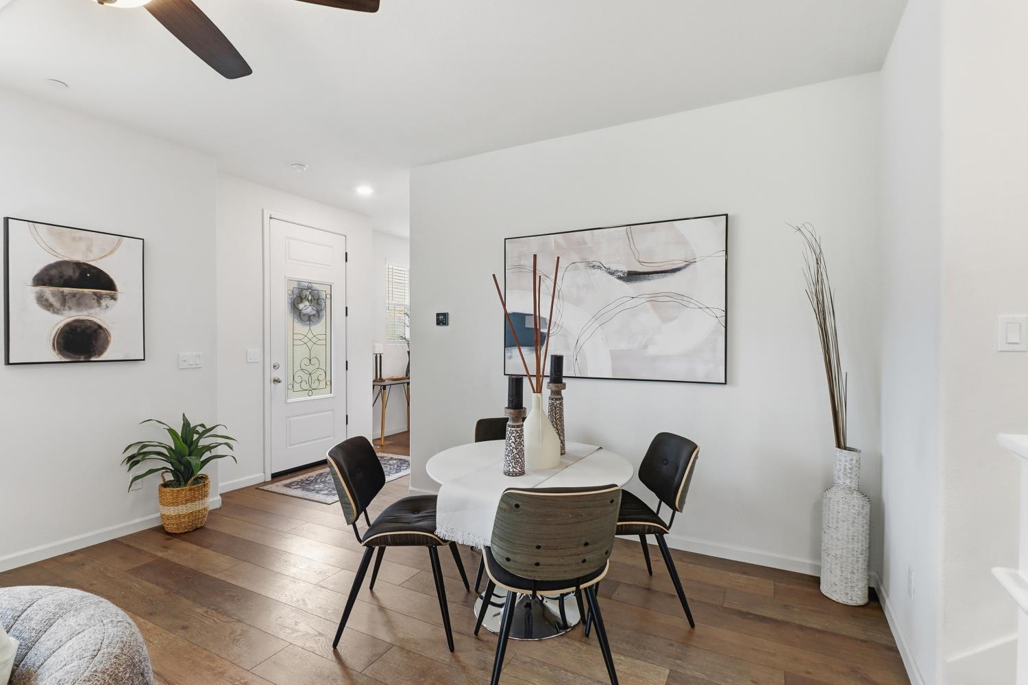 8900 Sheldon Terrace Lane Elk Grove, CA 95758 - Photo 13 of 57 a view of a livingroom with furniture and a potted plant