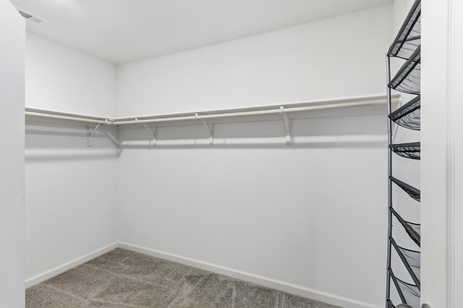 8900 Sheldon Terrace Lane Elk Grove, CA 95758 - Photo 35 of 57 a view of an empty walk in closet