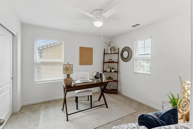 a bathroom with 2 sink and a mirror