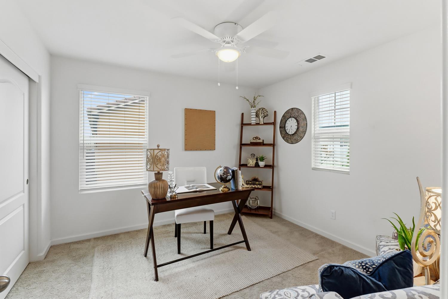 8900 Sheldon Terrace Lane Elk Grove, CA 95758 - Photo 36 of 57 a living room with furniture and a window