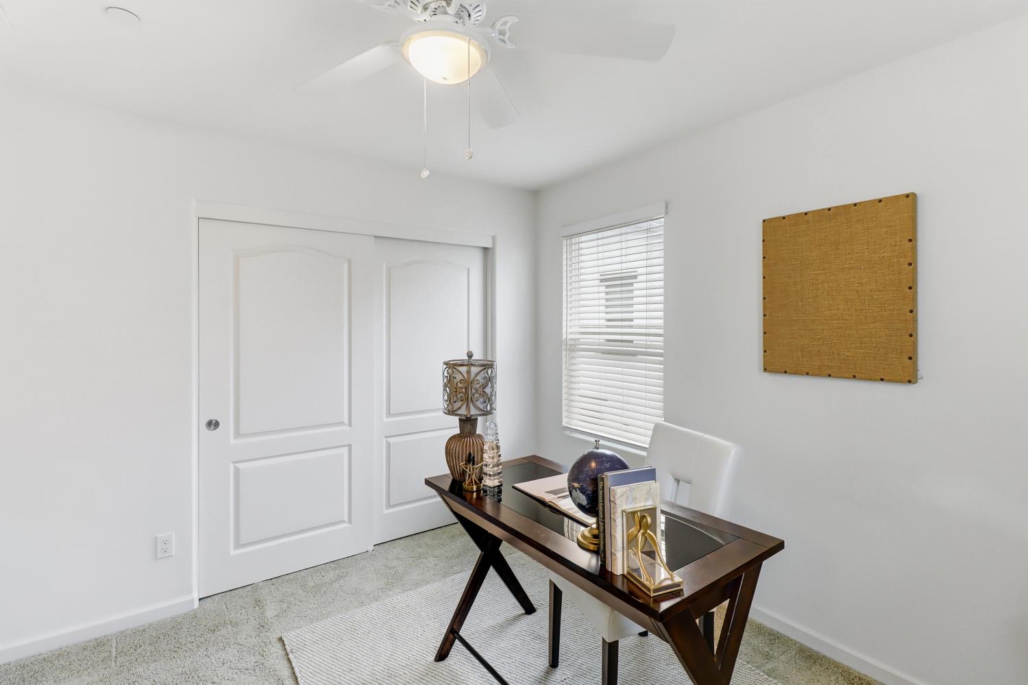 8900 Sheldon Terrace Lane Elk Grove, CA 95758 - Photo 38 of 57 a living room with furniture and a window