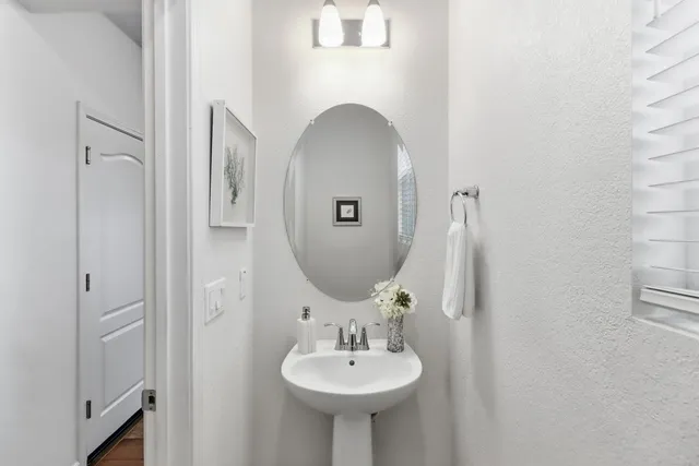 a view of a house with a yard and table