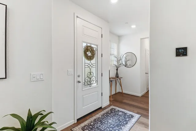 a view of a hallway with entryway