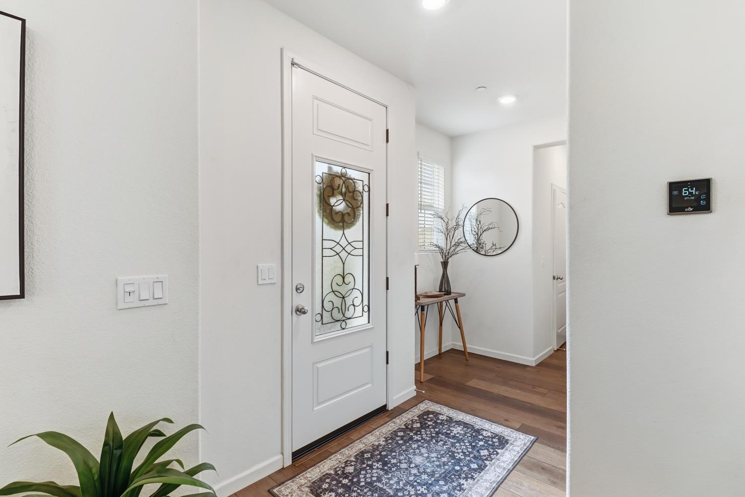 8900 Sheldon Terrace Lane Elk Grove, CA 95758 - Photo 5 of 57 a view of a hallway with entryway